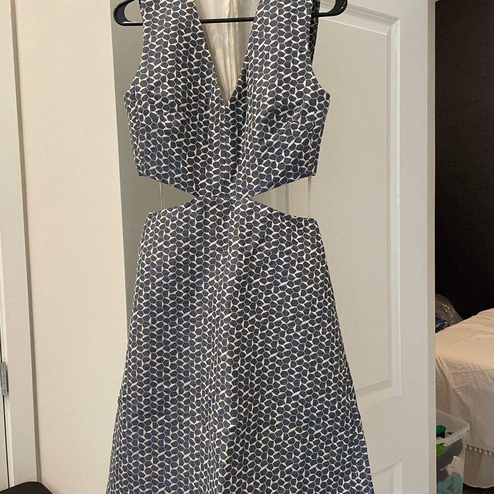 Tory Burch statement midi cutout dress. Wear it to brunch or upcoming occasion